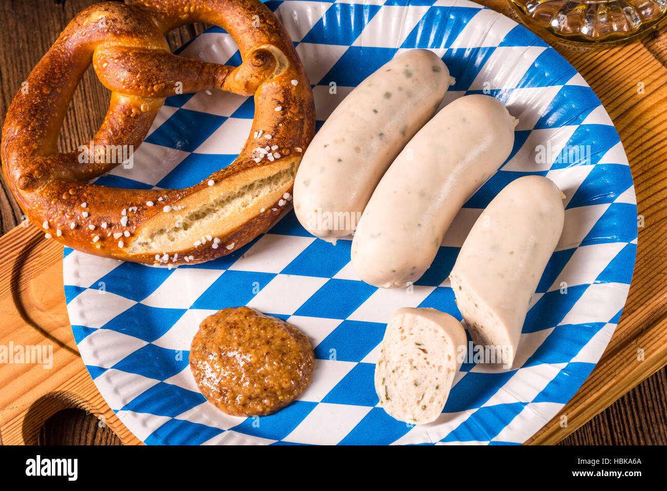Bavarian sausage with pretzel, sweet mustard and beer Stock Photo Alamy