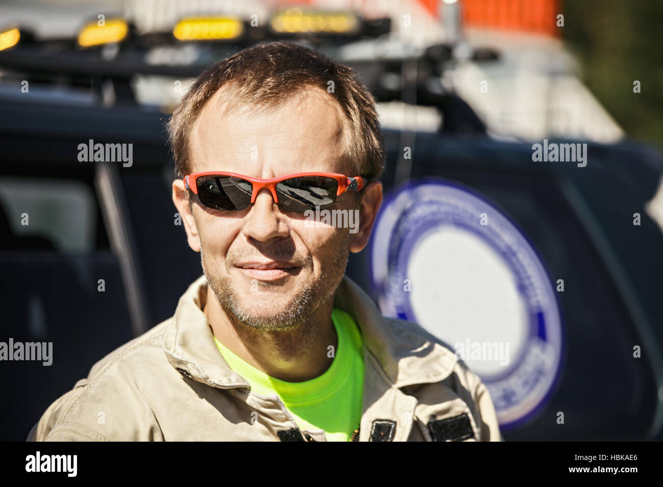 Portrait of rescuer at car Stock Photo