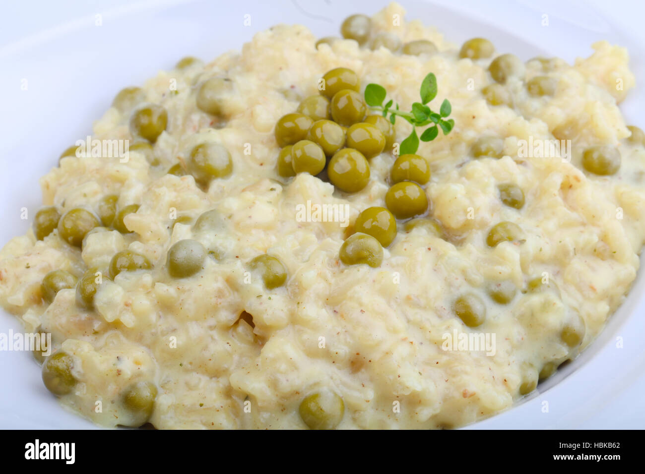 Risotto with green peas and parmesan cheese Stock Photo - Alamy
