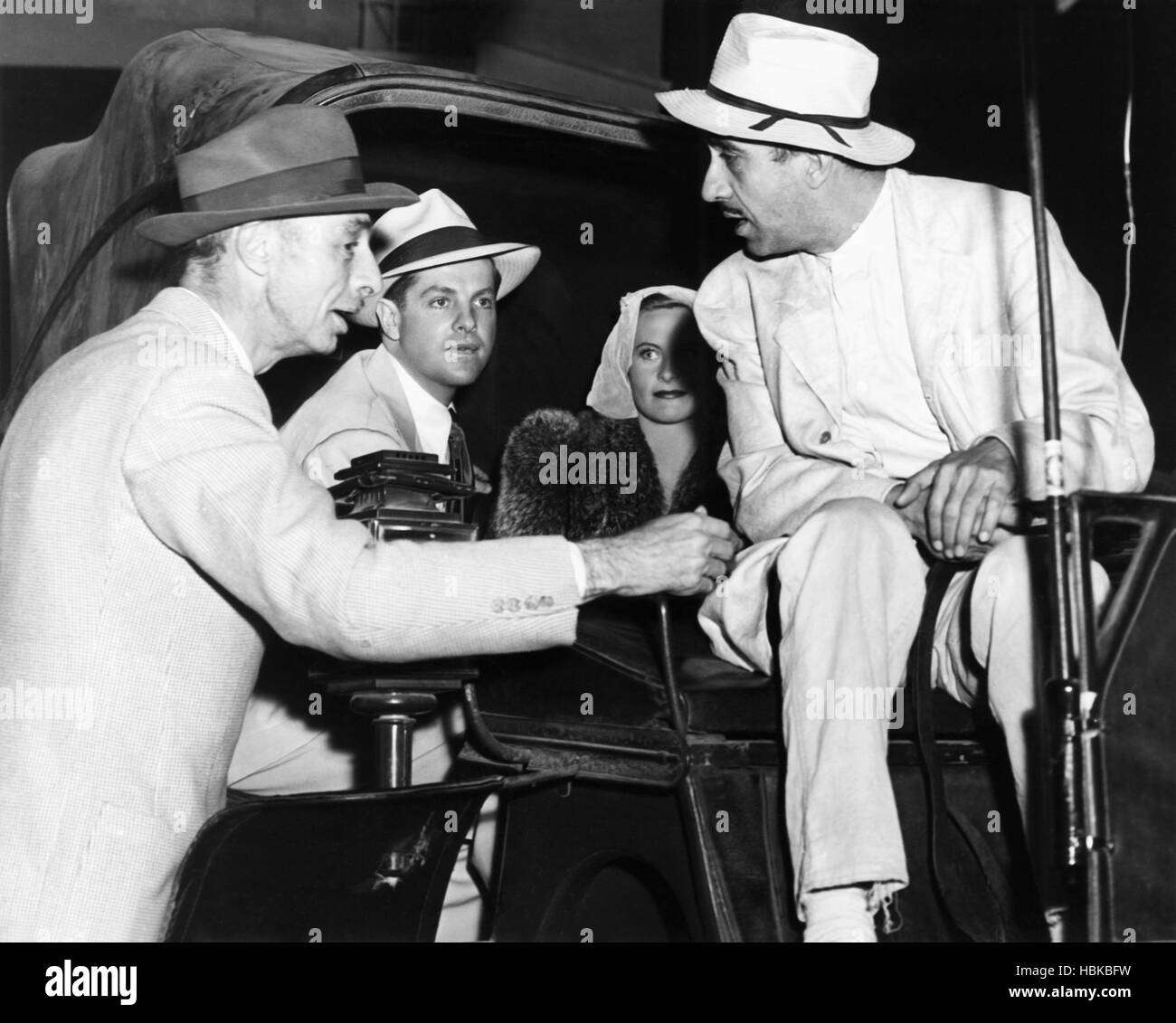 THE CHASE, from left: director Arthur Ripley, Robert Cummings, Michele ...
