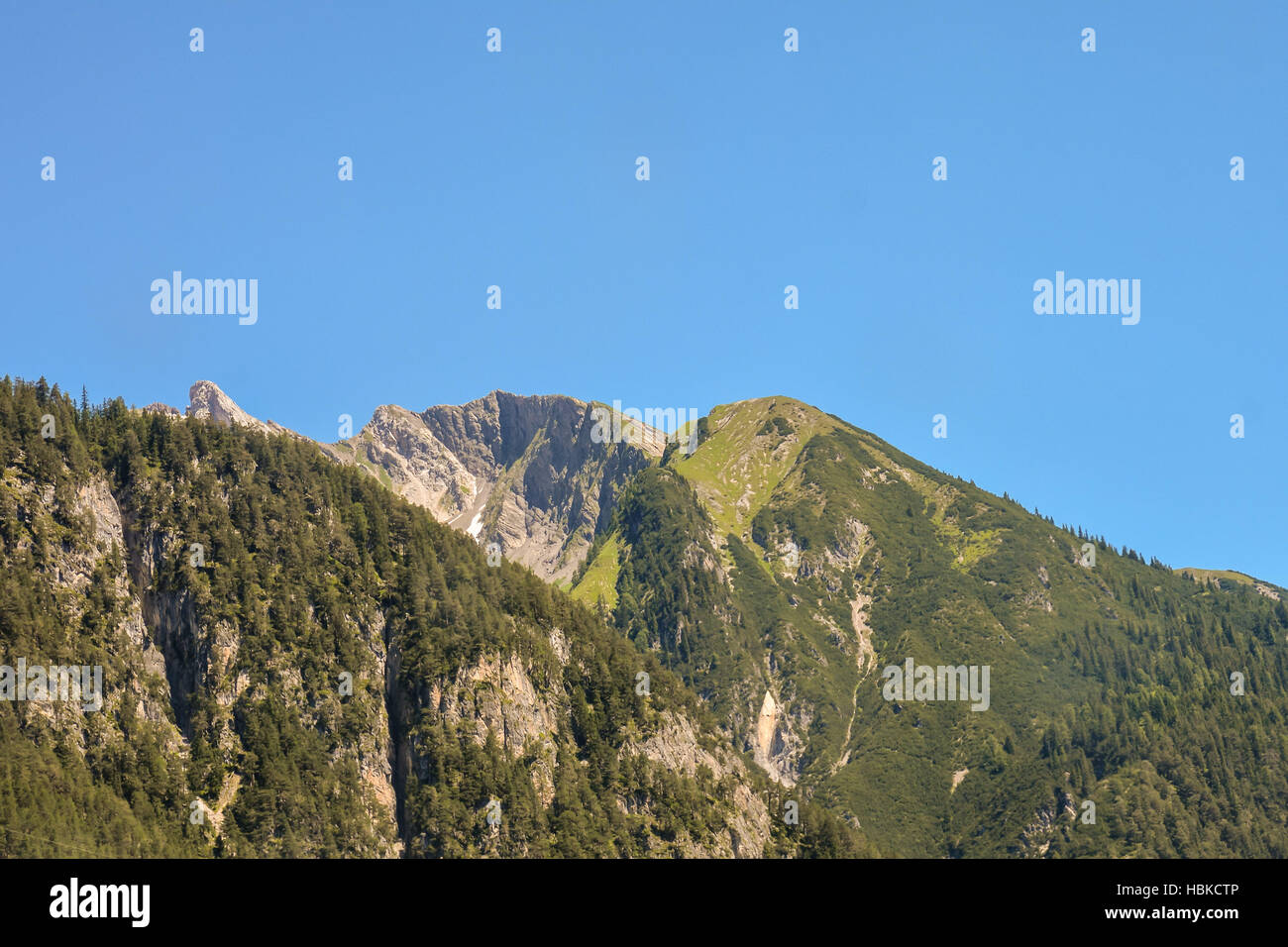 Panorama view of Alps peaks background Stock Photo - Alamy