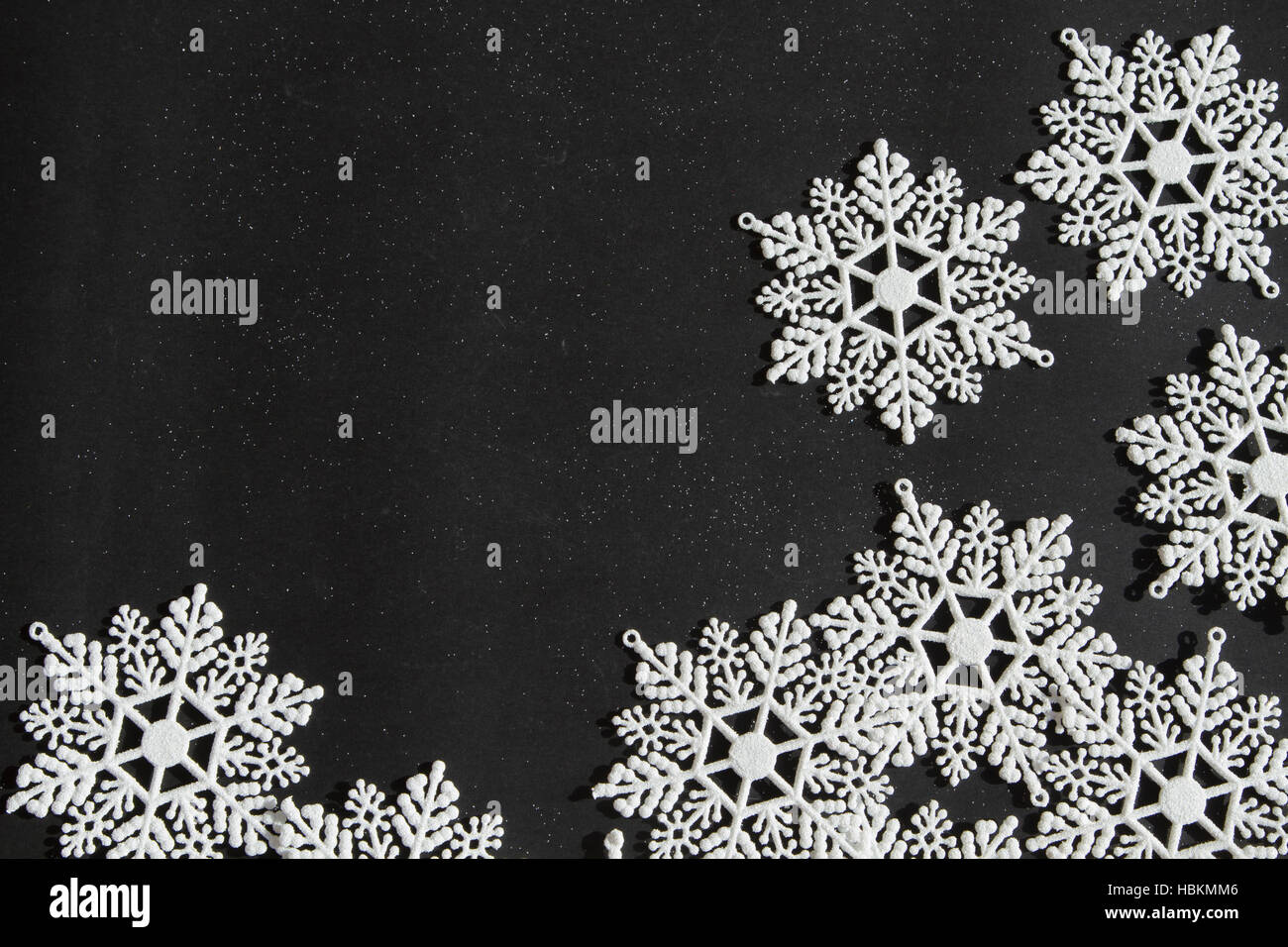 White snowflakes on the black background Stock Photo - Alamy