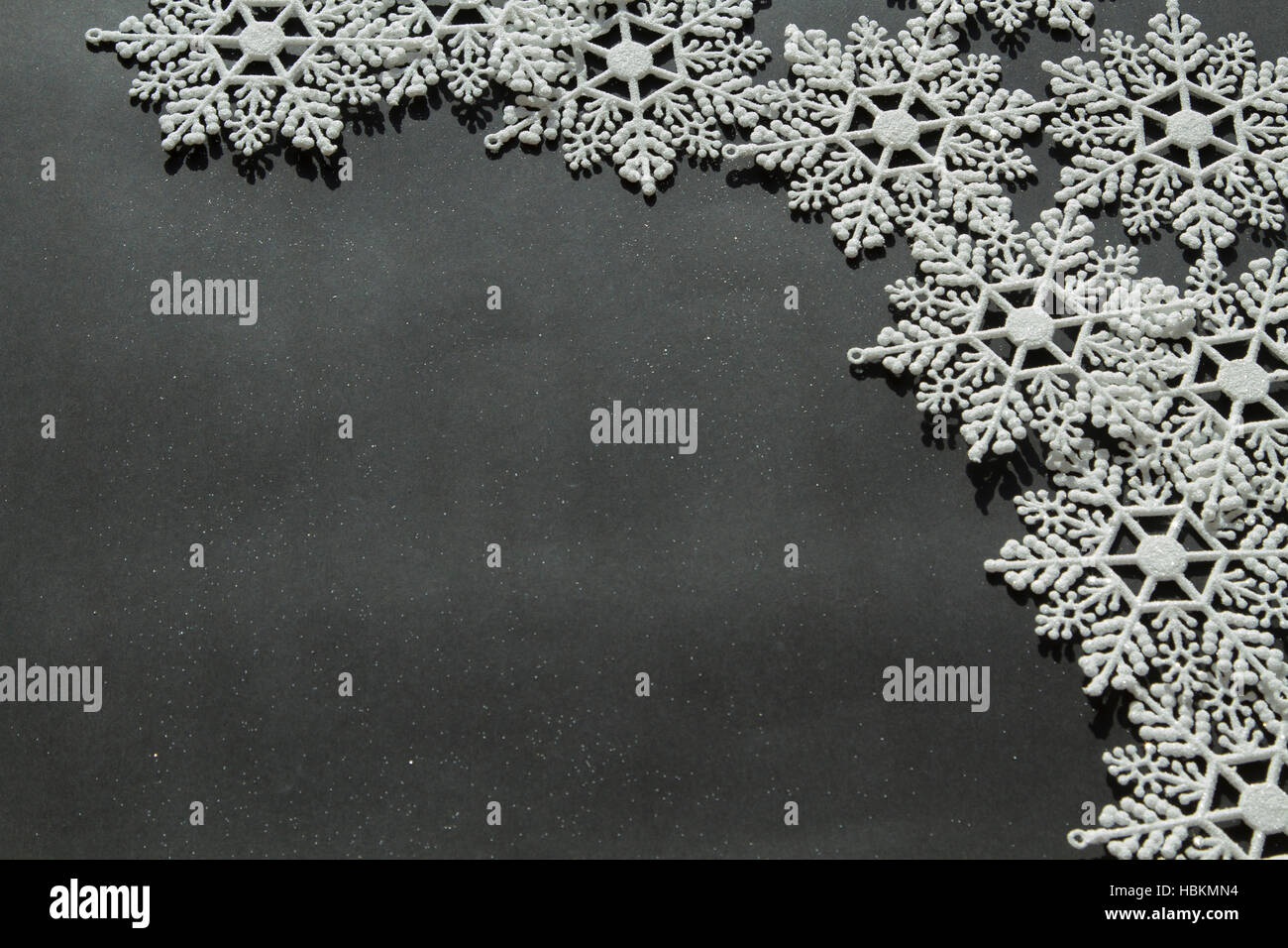 White snowflakes on the black background Stock Photo - Alamy