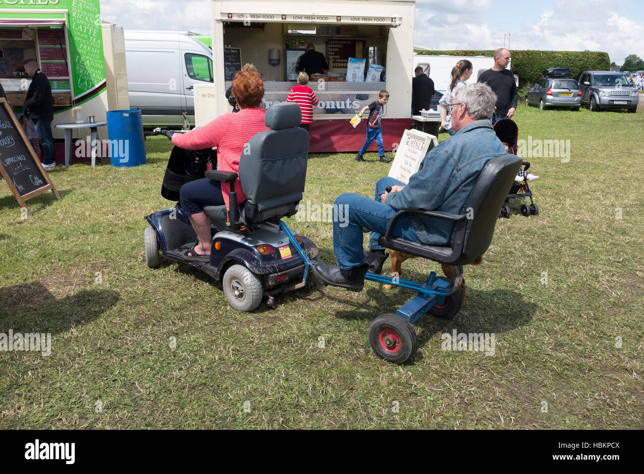 Mobility Scooter with Trailer Seat Stock Photo - Alamy