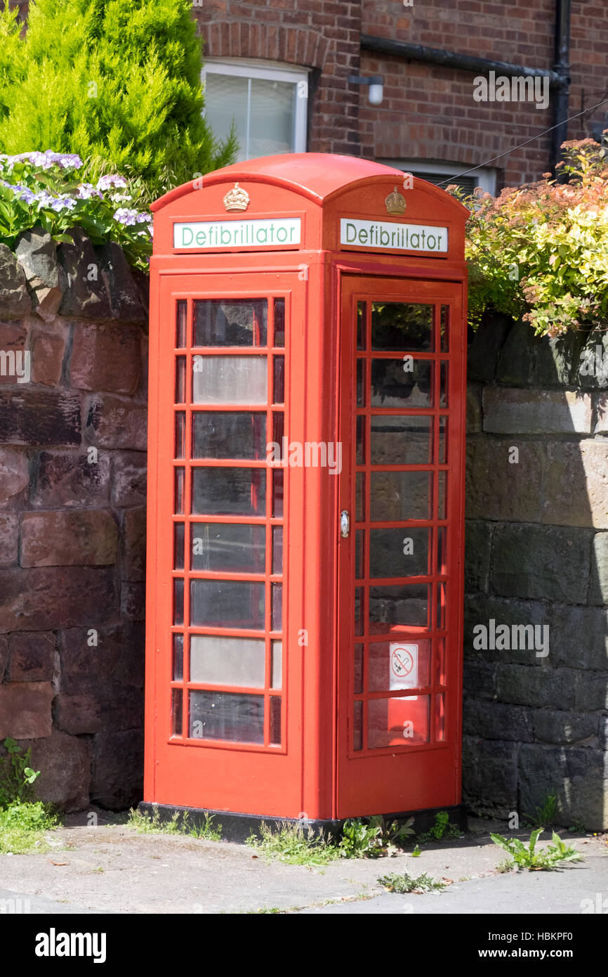 British Red Phone box Defibrillator Stock Photo