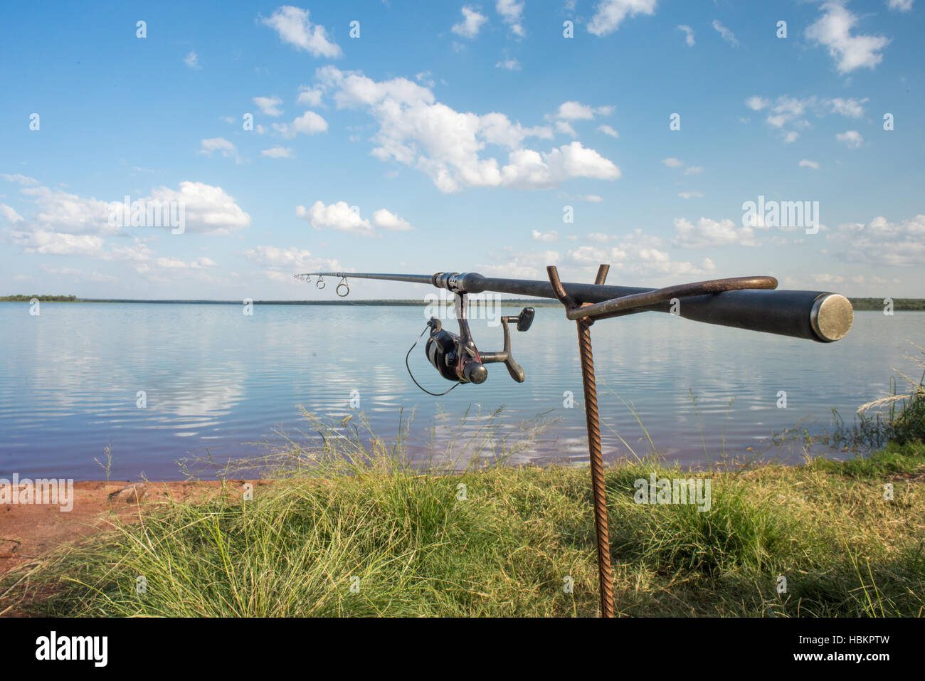 Fishing rod by the lake Stock Photo