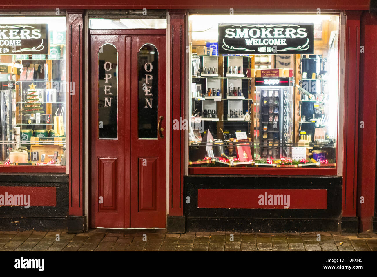 Smokers Miss Moran's tobacco shop at night, Belfast, Northern