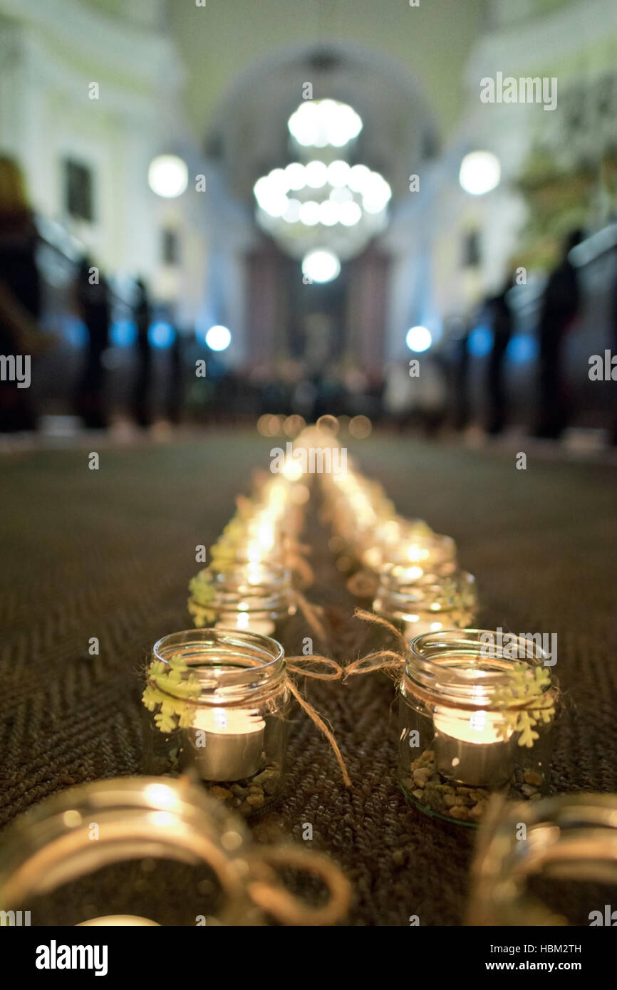 Line of flaming candles in the baroque church Stock Photo Alamy