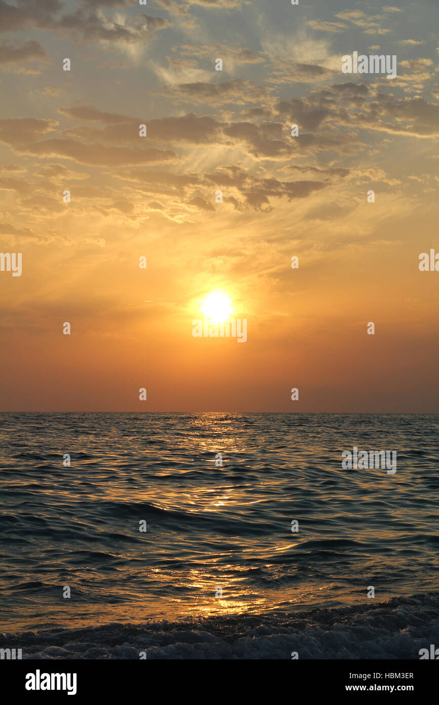 Sunset sky at the sea Stock Photo - Alamy
