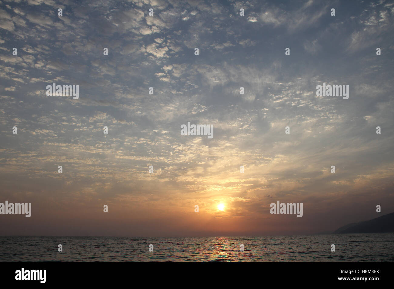 Sunset sky at the sea Stock Photo - Alamy