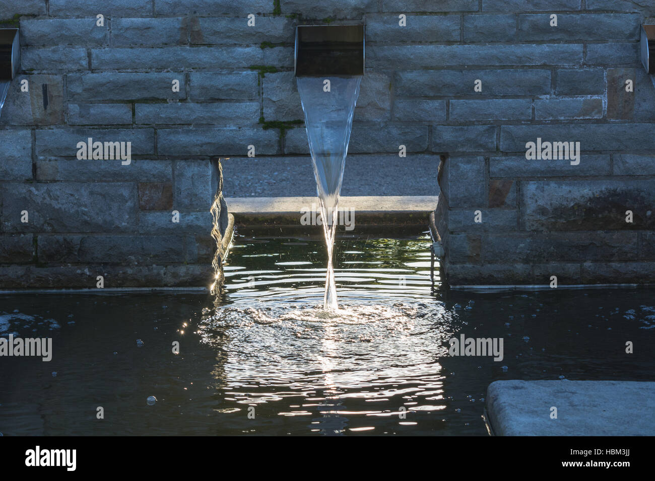 Water supply for a garden pond Stock Photo Alamy