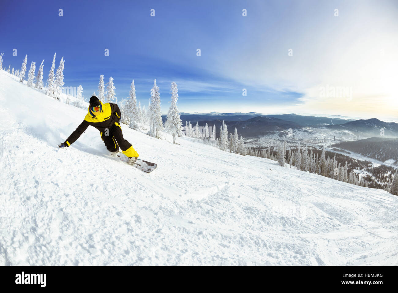 Snowboarder slope downhill mountains ski Stock Photo