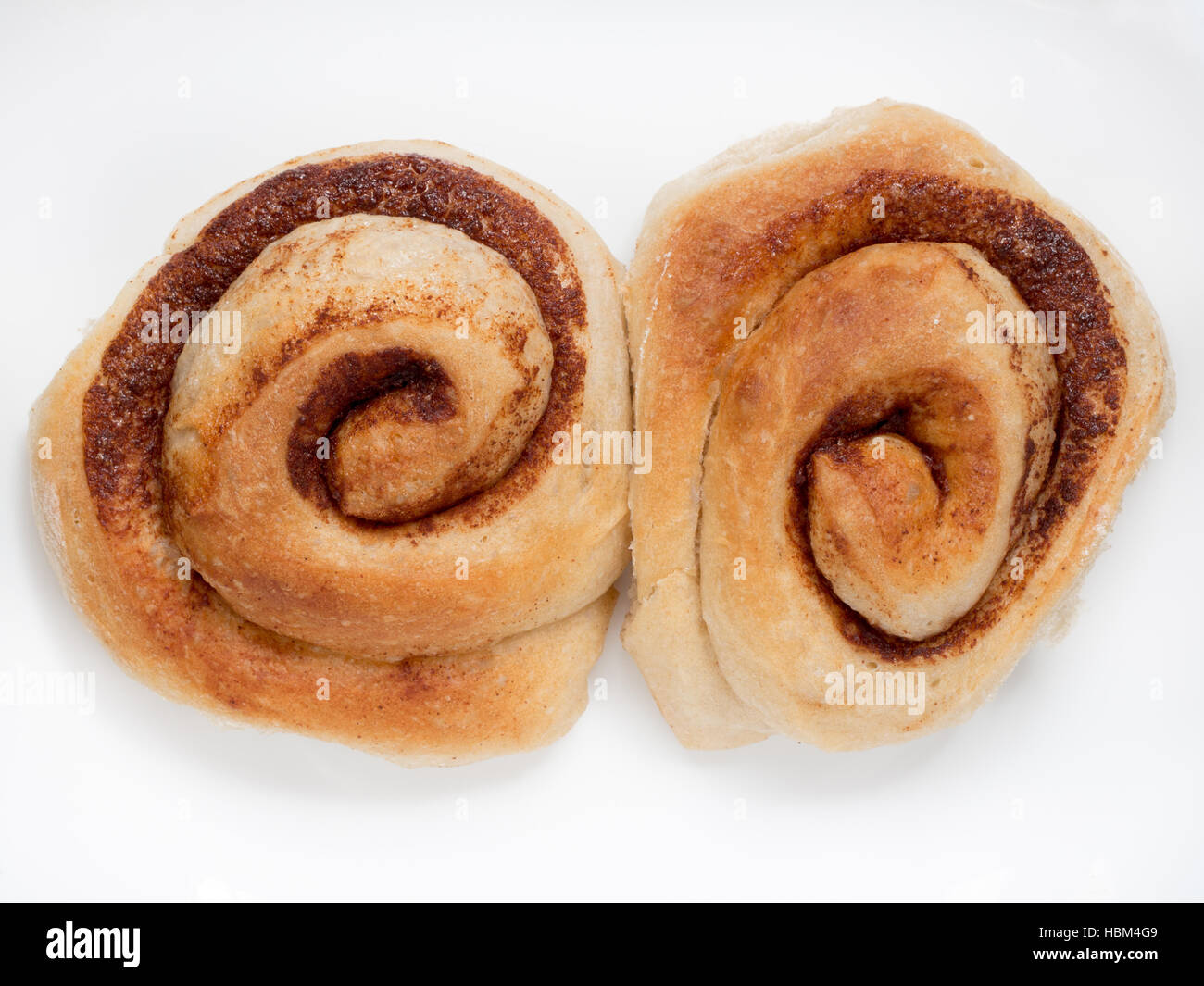 Homemade cinnamon rolls on the isolated white background Stock Photo ...