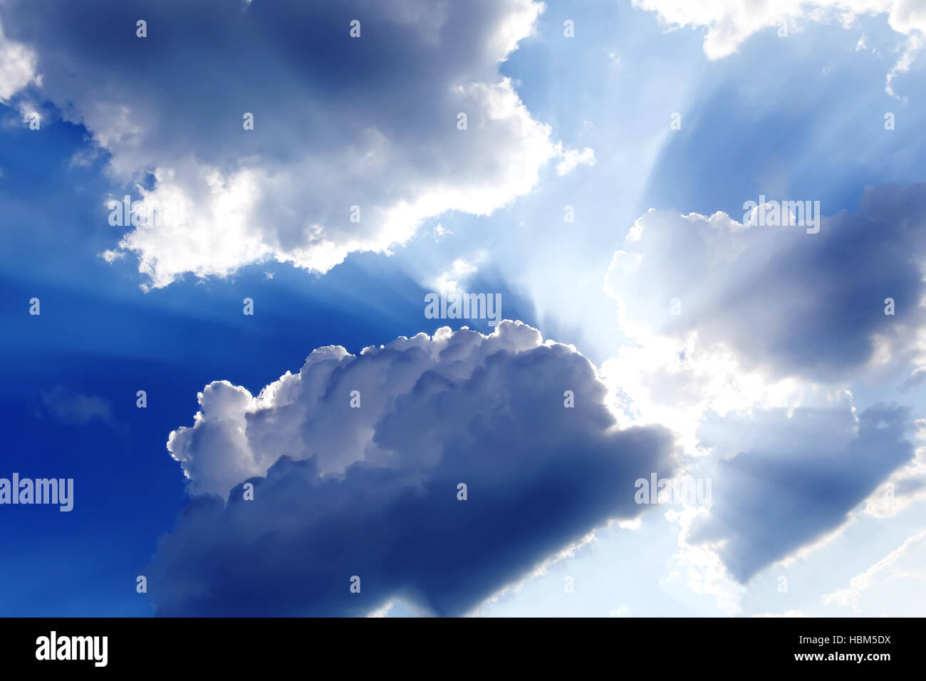 Sun rays through the clouds Stock Photo - Alamy