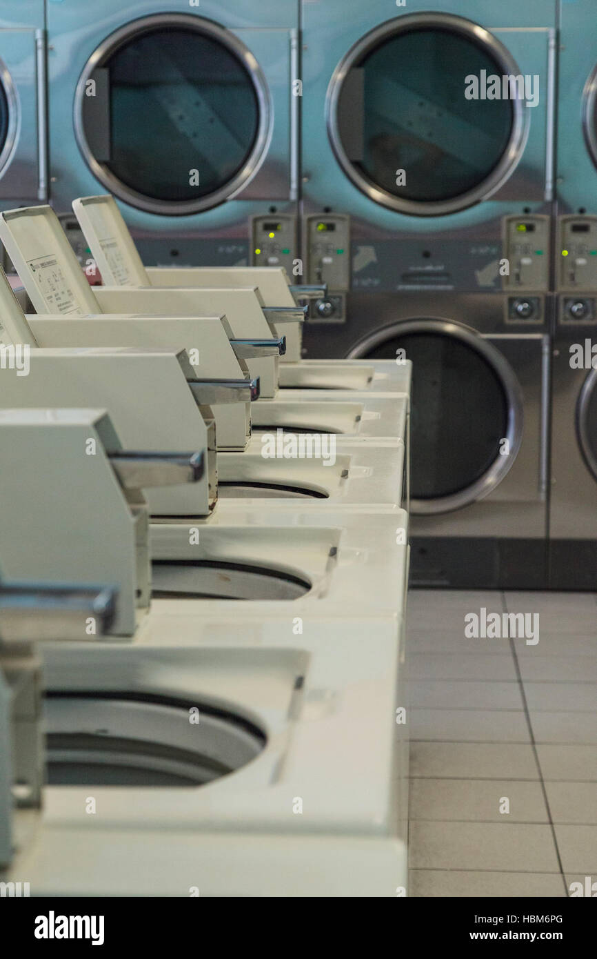Washing clothes and drying at the Laundromat Stock Photo Alamy