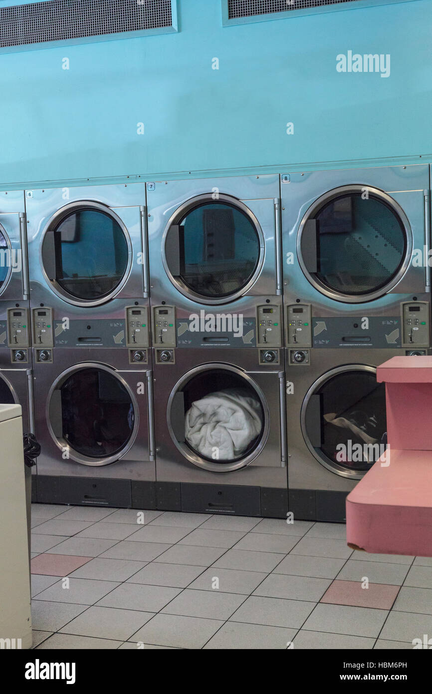 Washing clothes and drying at the Laundromat Stock Photo Alamy