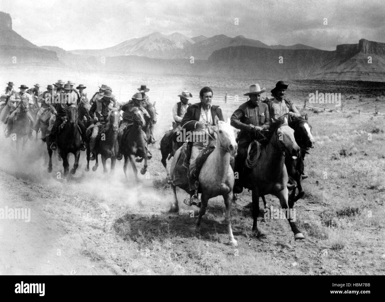 THE COMANCHEROS, first two from front Stuart Whitman, Bruce Cabot