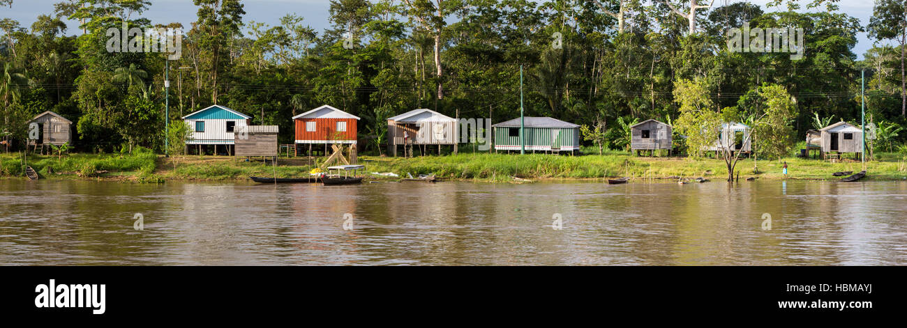 Wooden house on stilts along the Amazon river and rain forest, Brazil Stock Photo