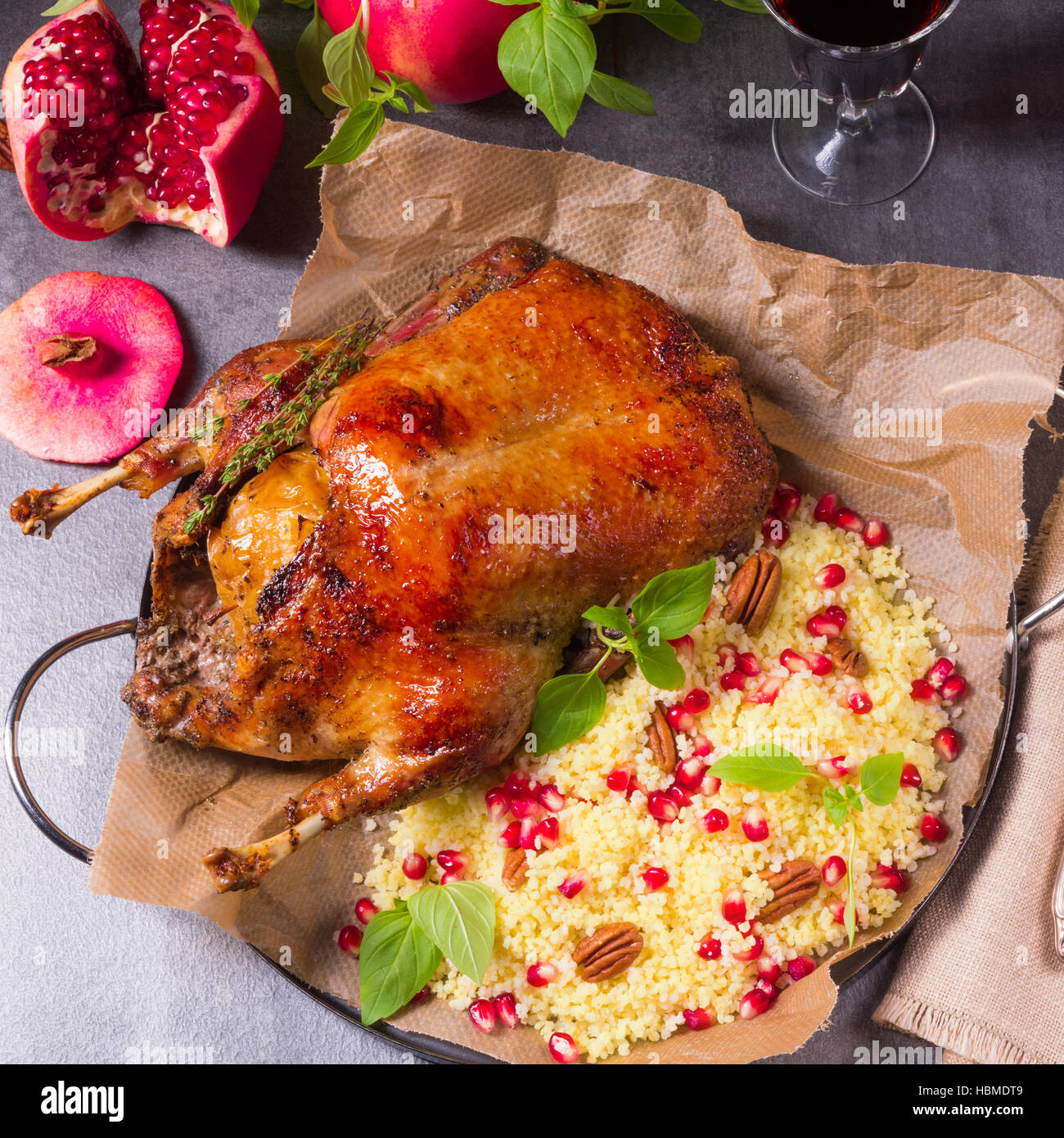 Duck with millet and pomegranate Stock Photo Alamy