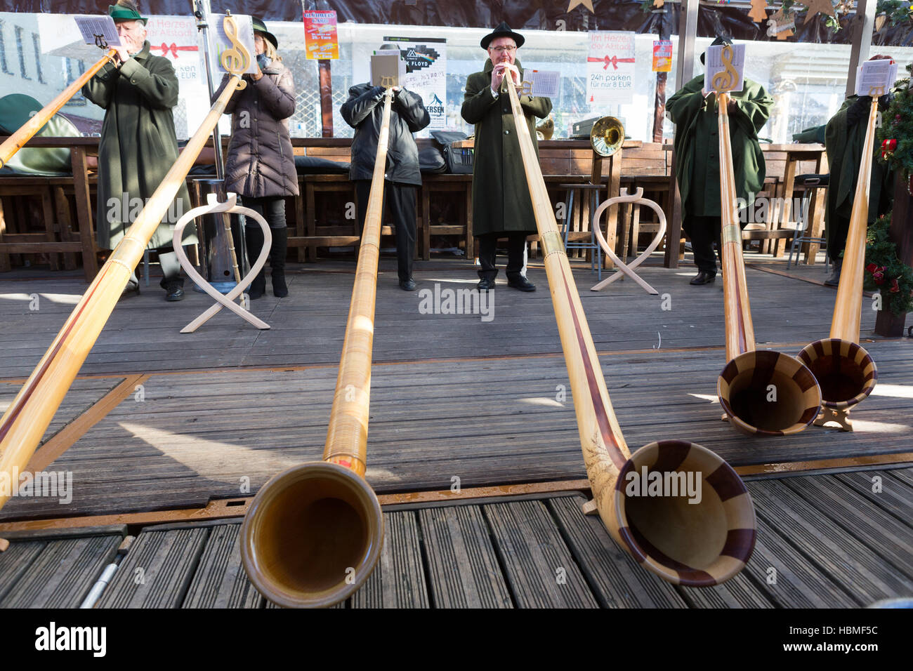 Musicians playing alphorns in Möchengladbach's Christmas market Stock Photo