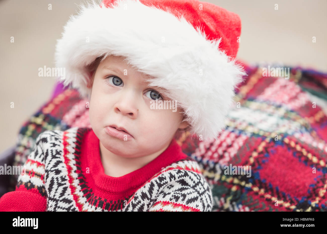 Little girl in red dress on the Christmas tree farm Stock Photo - Alamy