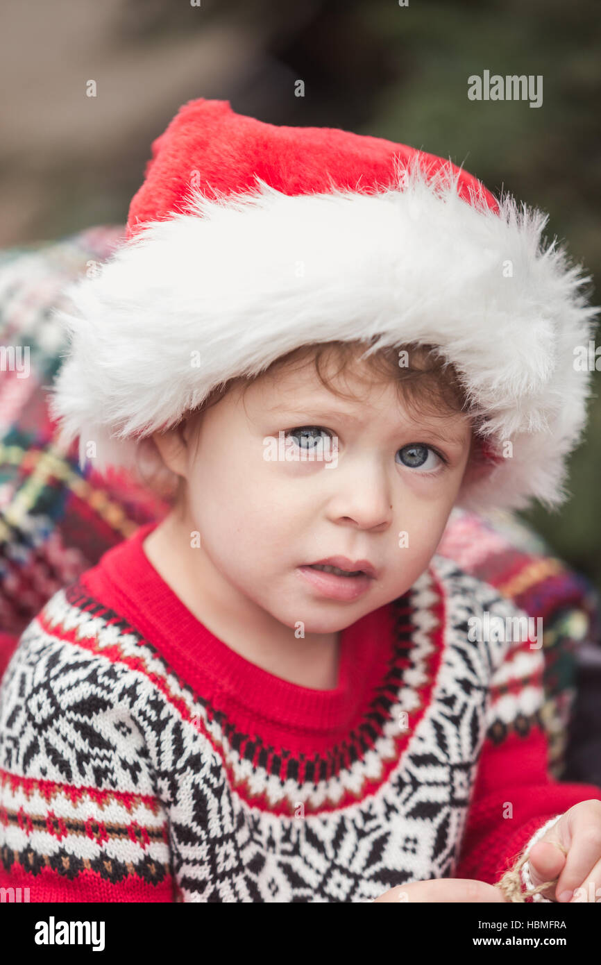 Little girl in red dress on the Christmas tree farm Stock Photo - Alamy