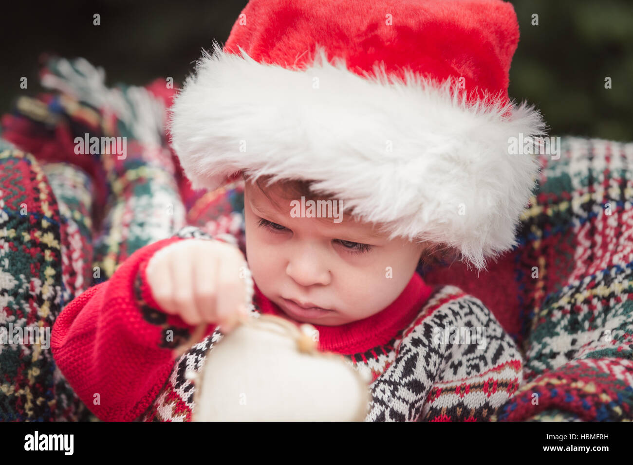 Little girl in red dress on the Christmas tree farm Stock Photo - Alamy