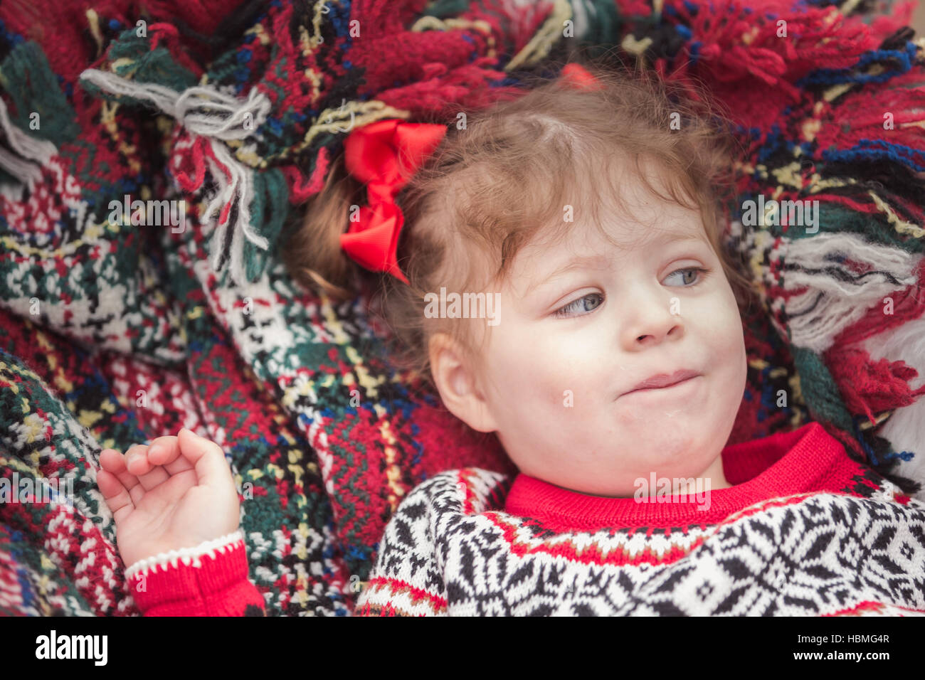 Little girl in red dress on the Christmas tree farm Stock Photo - Alamy