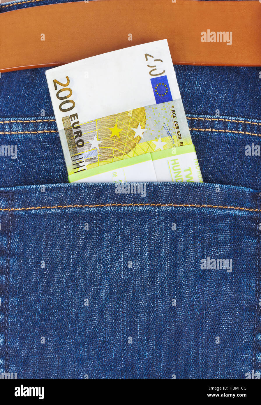 Money in jeans pocket Stock Photo Alamy