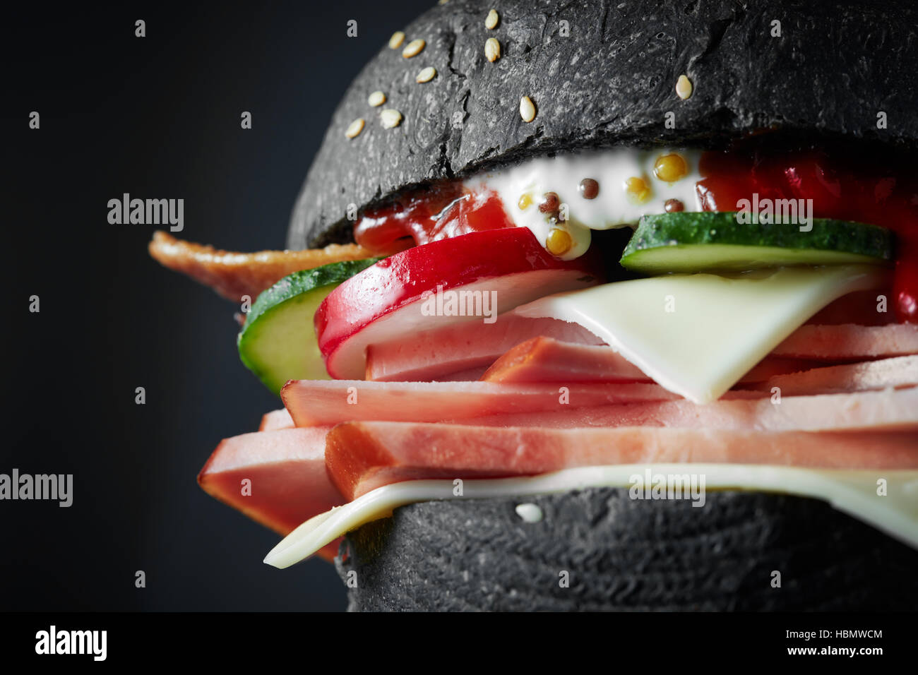 macro Black burger Stock Photo