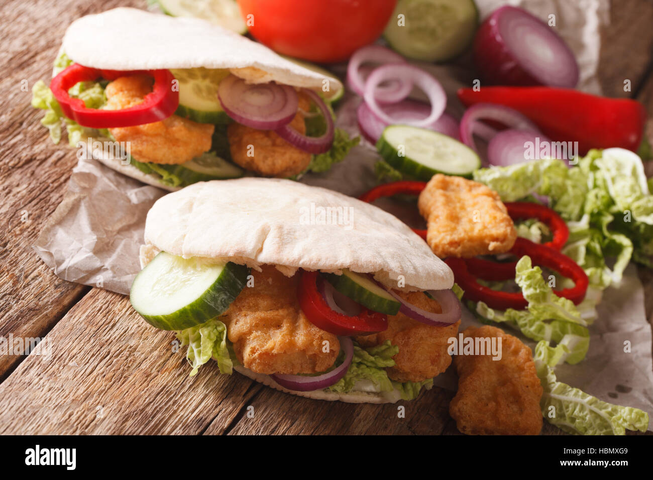 pita with roasted chicken, cucumber, nappa cabbage, onion and bell