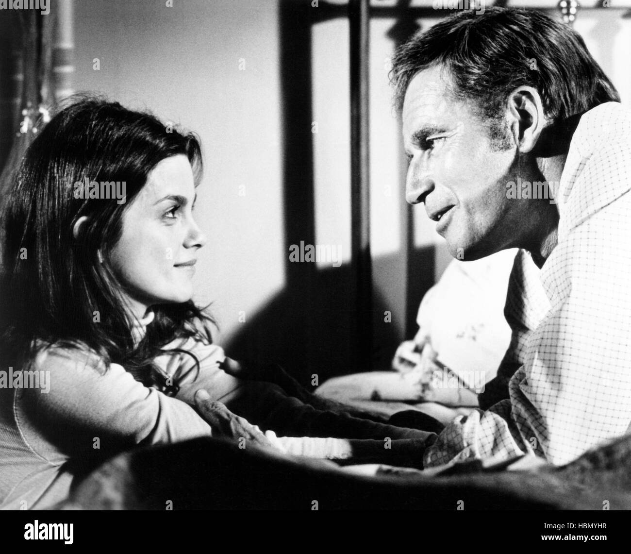 EARTHQUAKE, from left: Genevieve Bujold, Charlton Heston, 1974 Stock ...