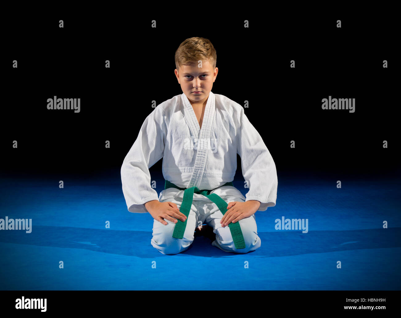 Boy martial arts fighter isolated Stock Photo Alamy