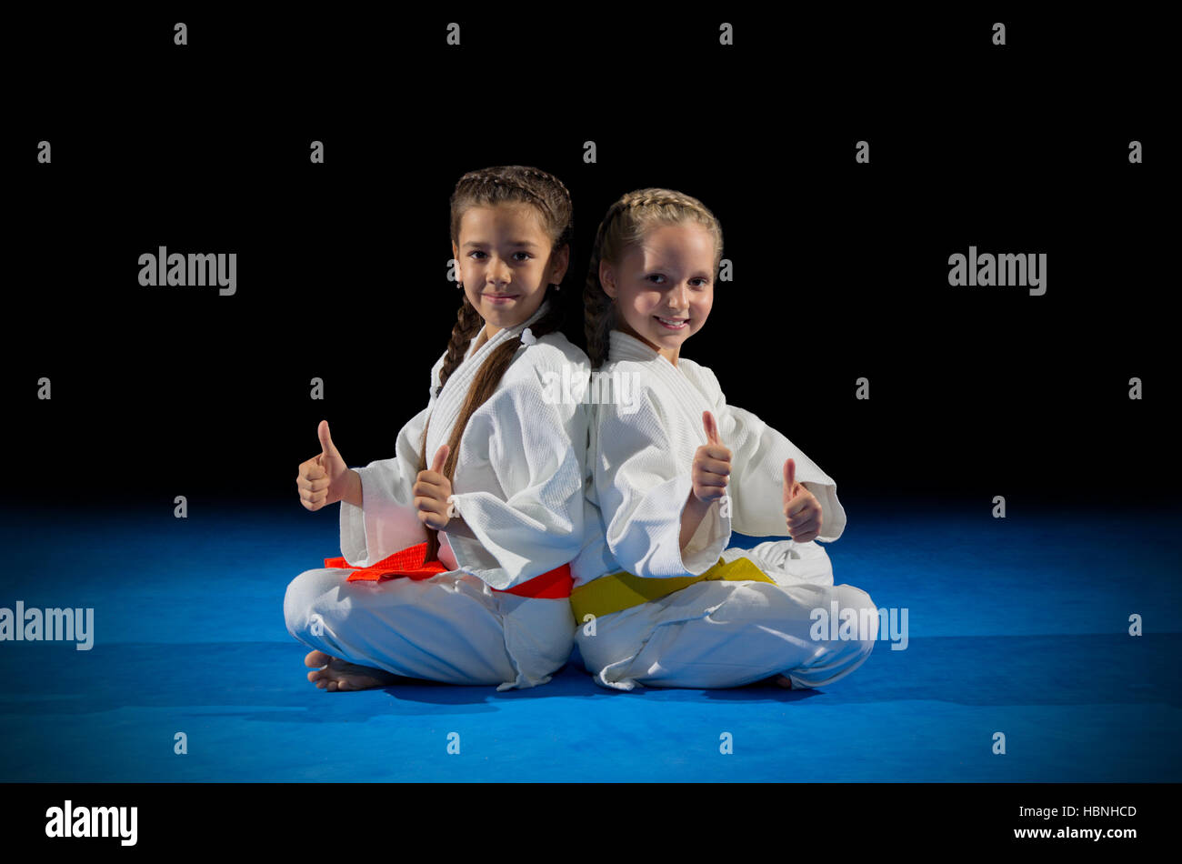 Little girls martial arts fighters isolated Stock Photo Alamy