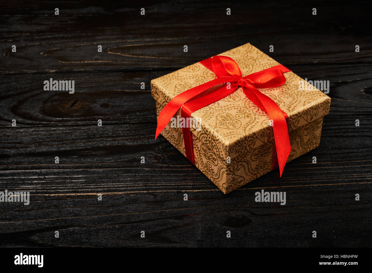 Gift box with red ribbon Stock Photo Alamy