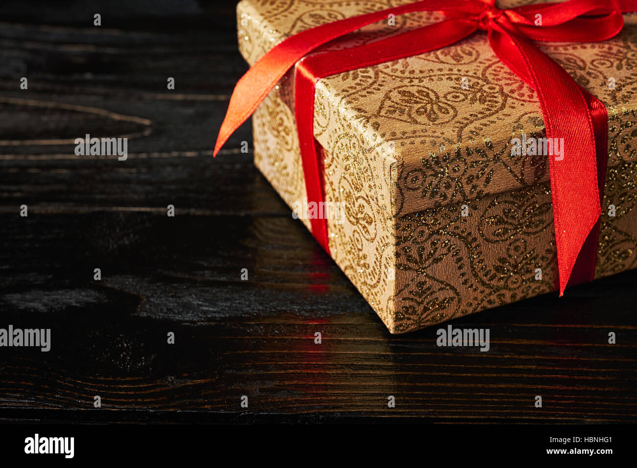 Gift box with red ribbon Stock Photo