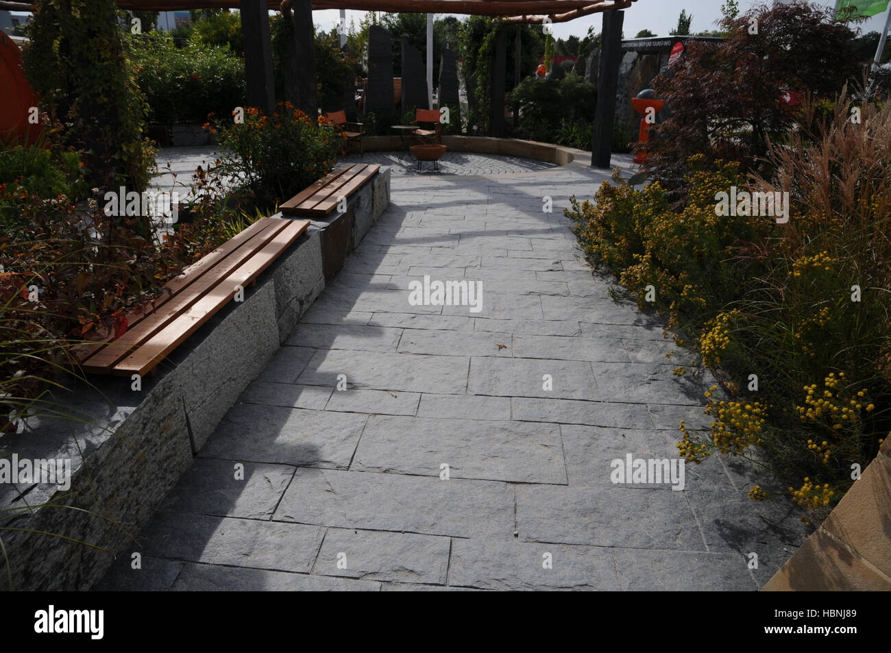 Garden with slate-pavement Stock Photo - Alamy