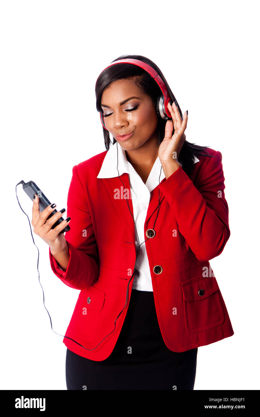 Business woman jamming listening to music Stock Photo