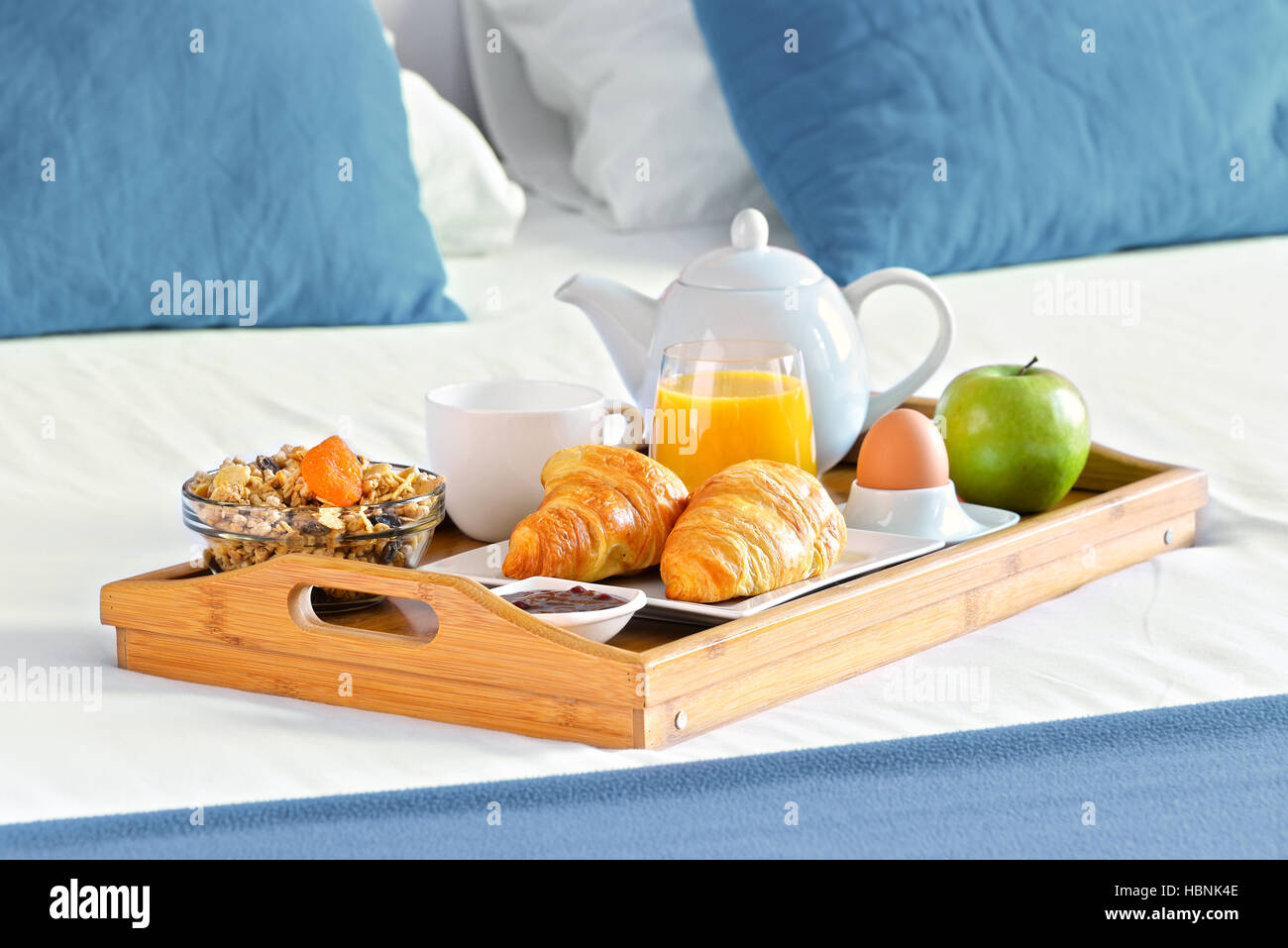 Breakfast on tray in bed in hotel room Stock Photo - Alamy