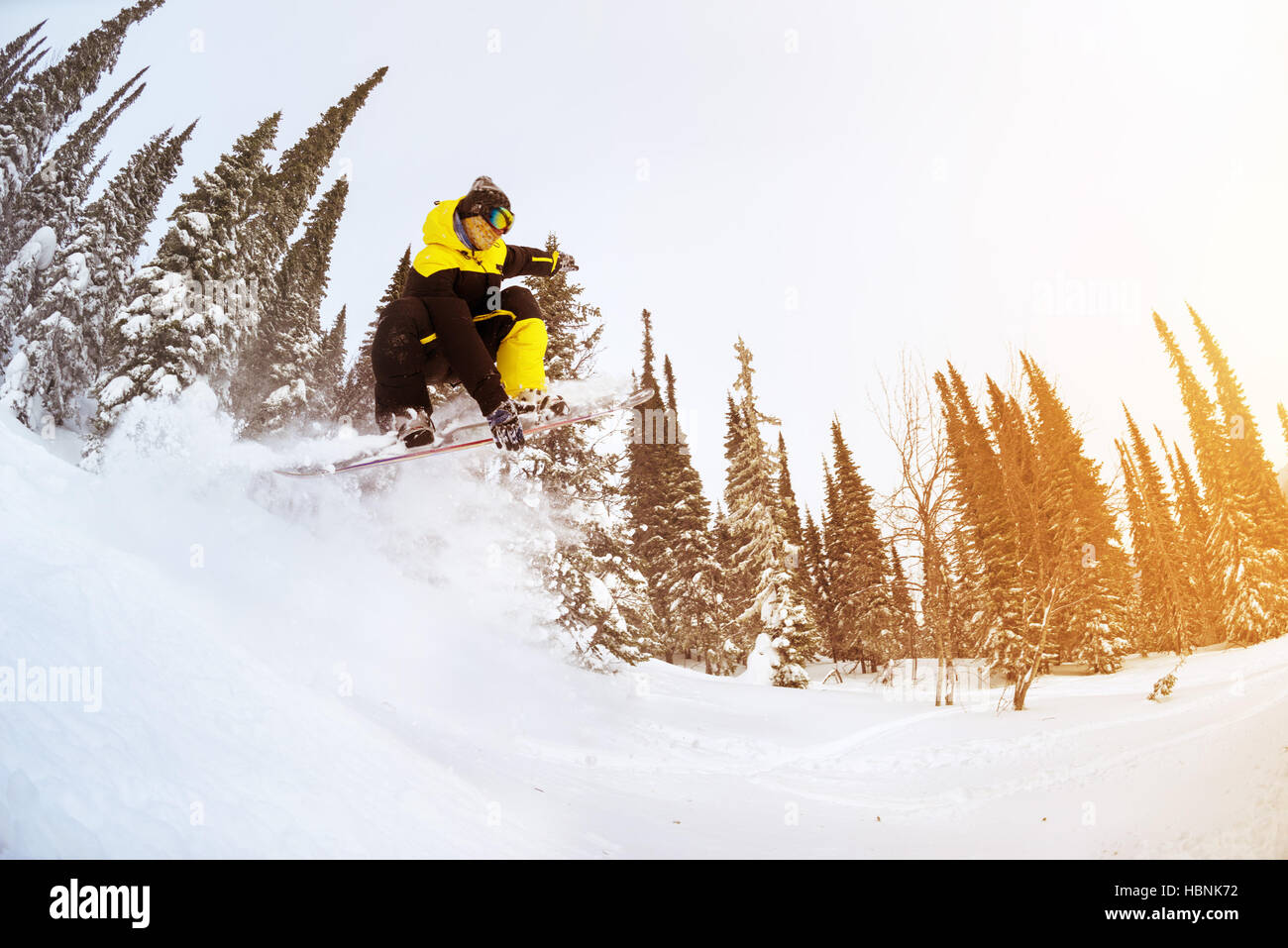 Snowboarder jump freeride backcountry ski Stock Photo