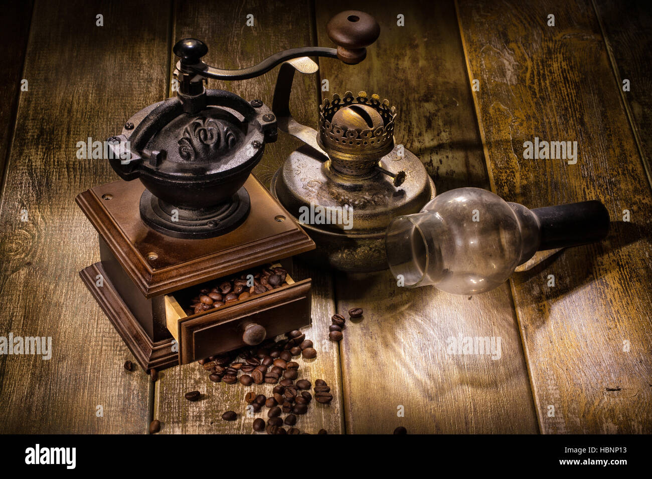 Coffee Mill And Old Oil Lamp Stock Photo Alamy