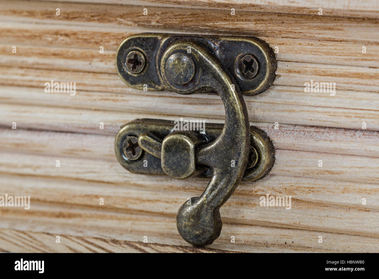 Fishing rods and equipment on wall above large basket on old