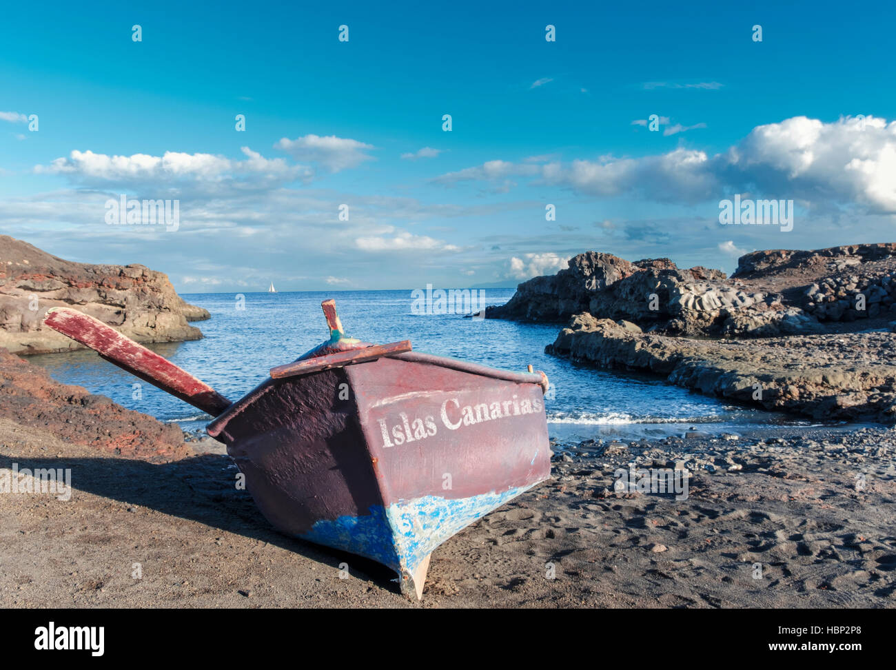 Picturesque old fishing boat on the volcano beach of 'Los vulcanos de teneguia' in the south of La Palma. Stock Photo