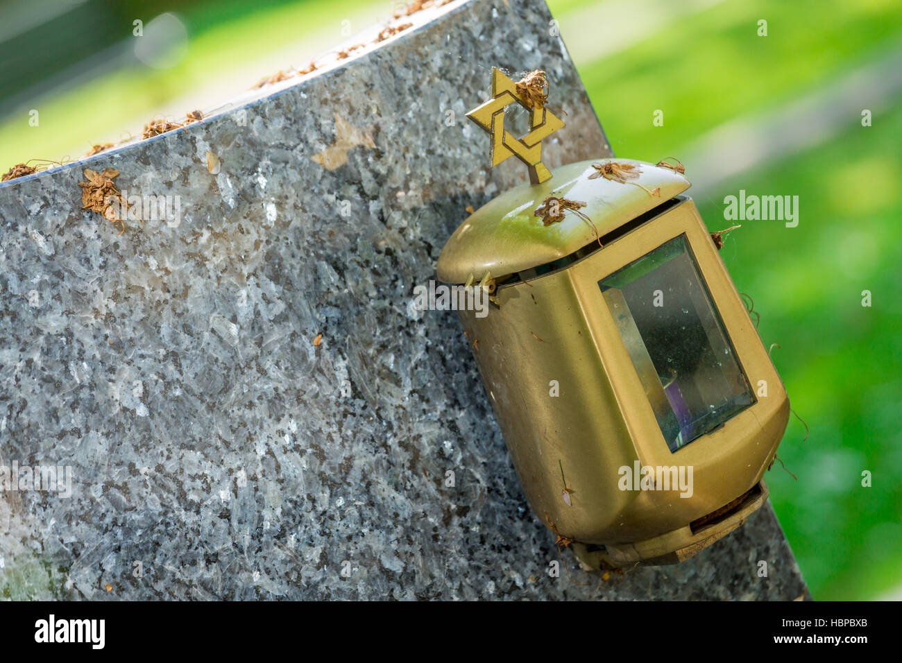 candle lantern on the stone grave Stock Photo Alamy