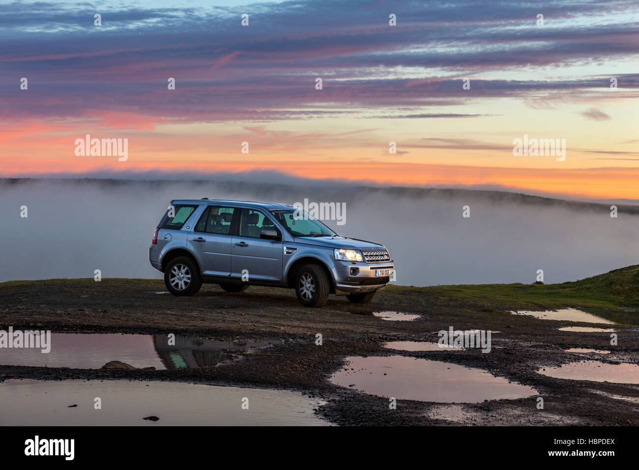 Land Rover Discovery at sunset, England, UK Stock Photo