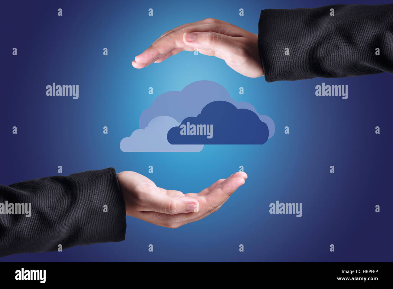 Clouds Above Hands. Cloud Computing Concept. Stock Photo