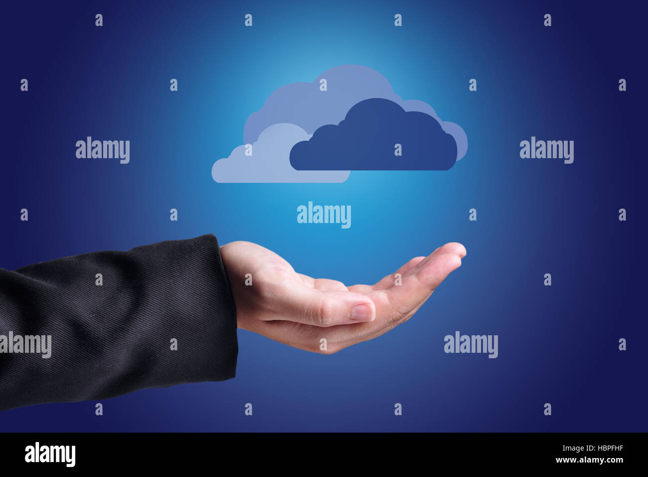 Clouds Above Hands. Cloud Computing Concept. Stock Photo
