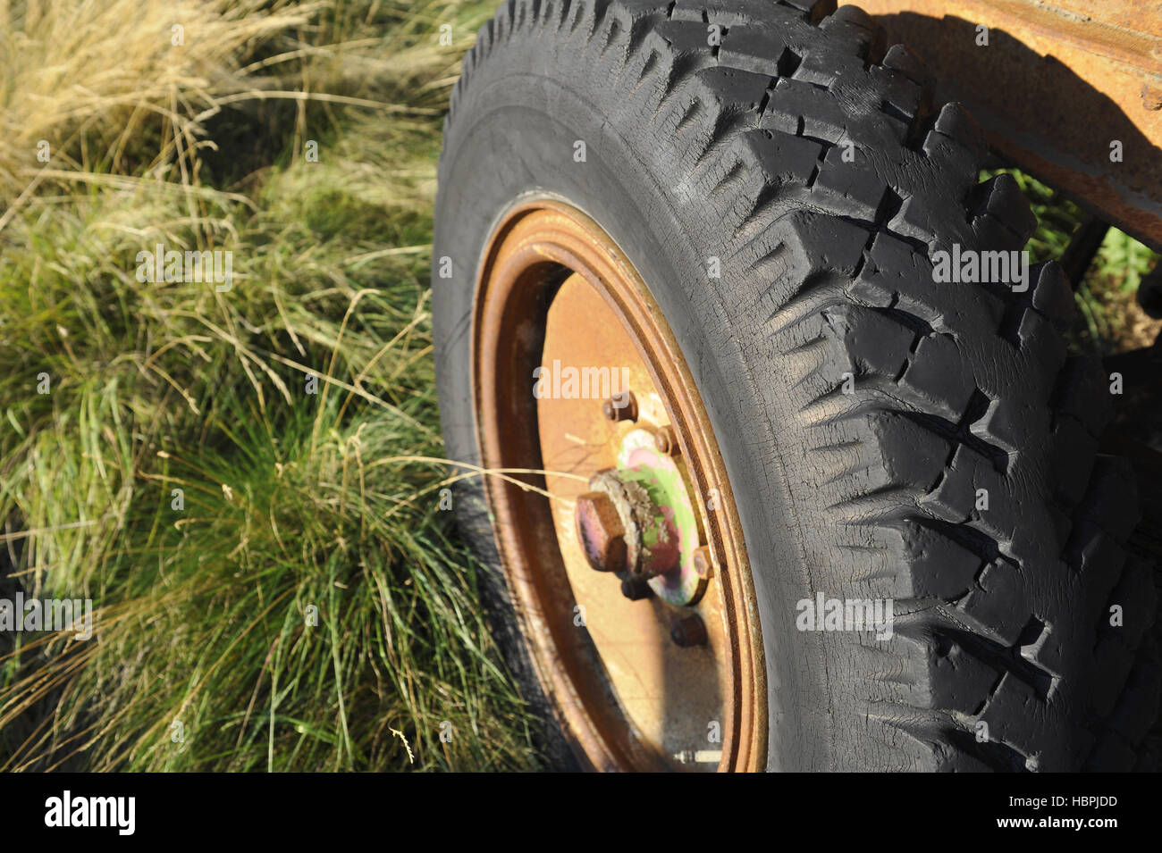 Old tire on the trailer Stock Photo