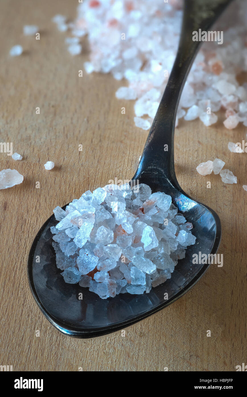 Himalayan Salt on Silver Spoon Stock Photo - Alamy