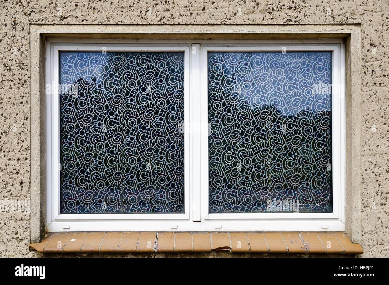 window with plastered panes Stock Photo